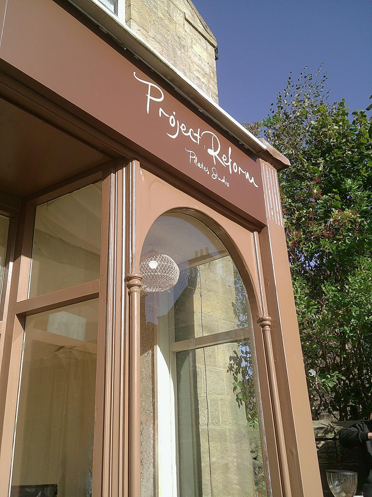 Our brown Project:Reform Pilates Studio shopfront on Town Street